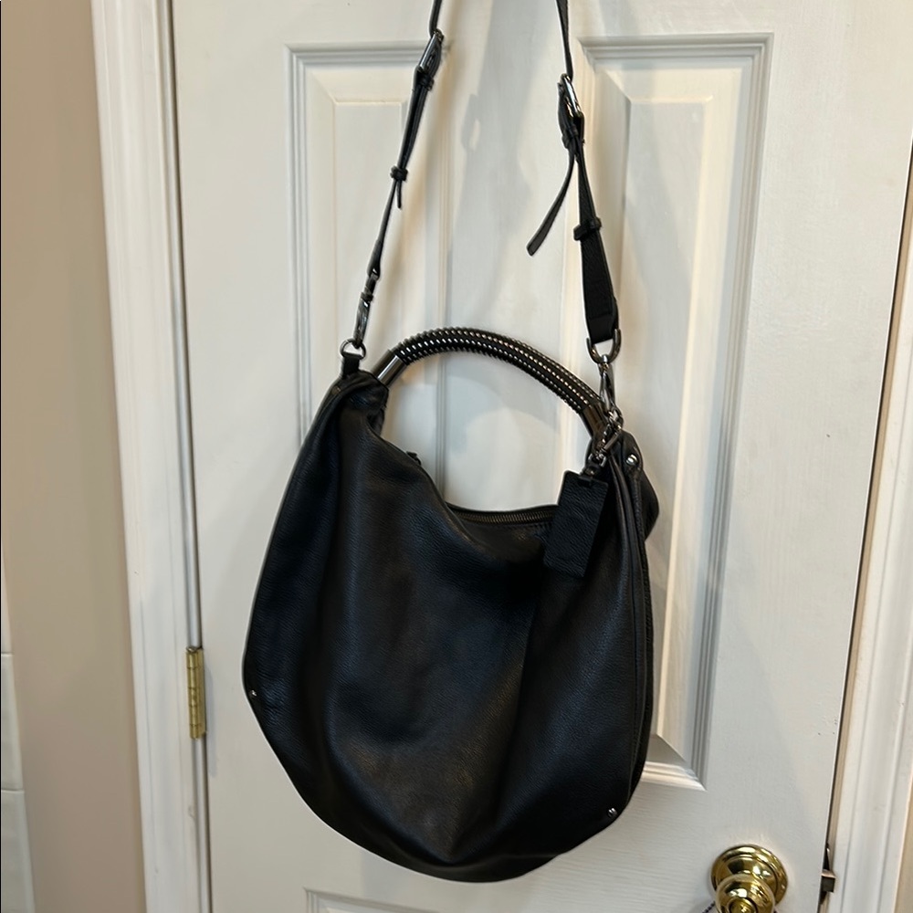 Kenneth Cole black leather shoulder bag  which has not been used